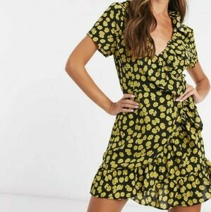 Brave soul ruffle wrap mini dress in black with daisy print